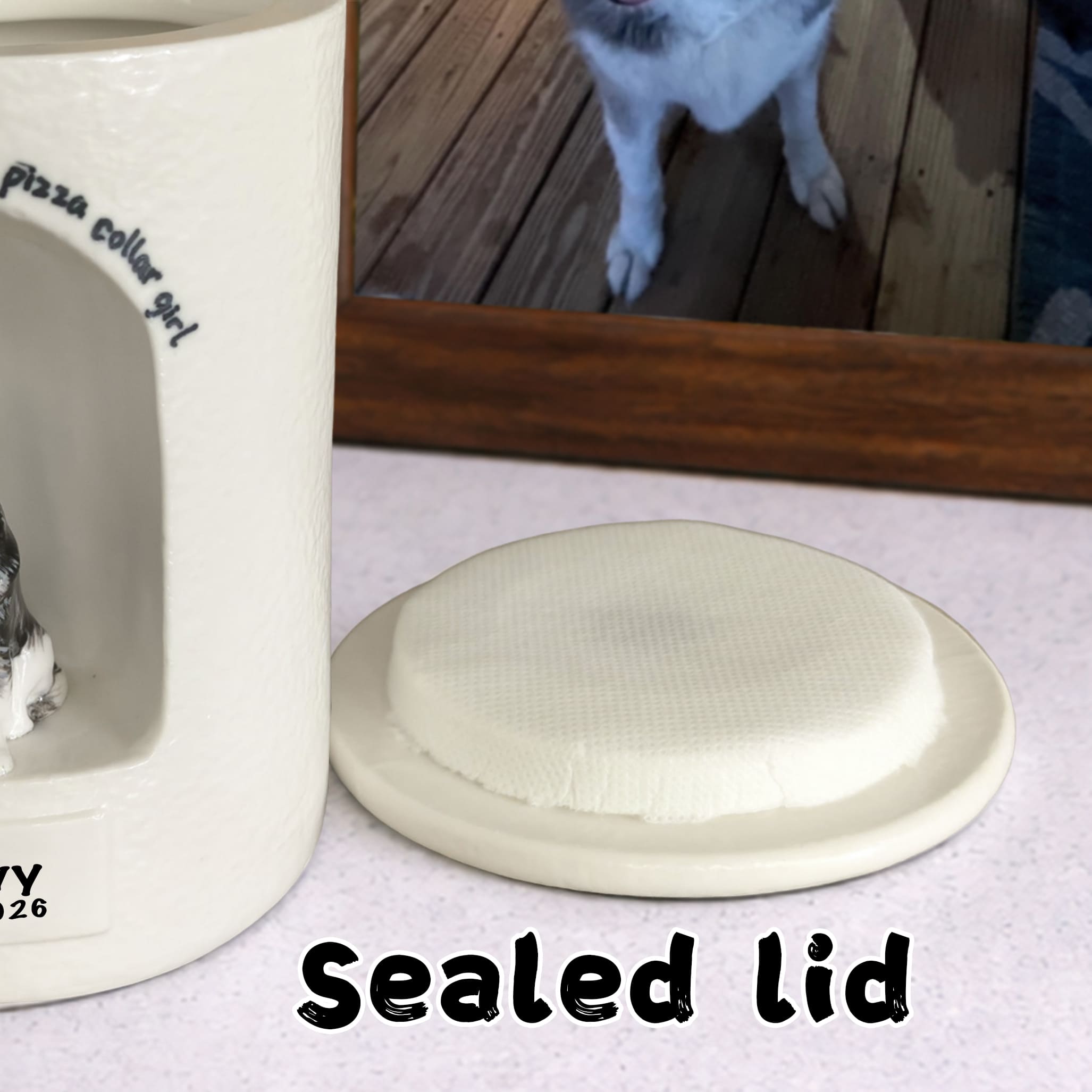 Cream ceramic urn lid with sealed top, close-up