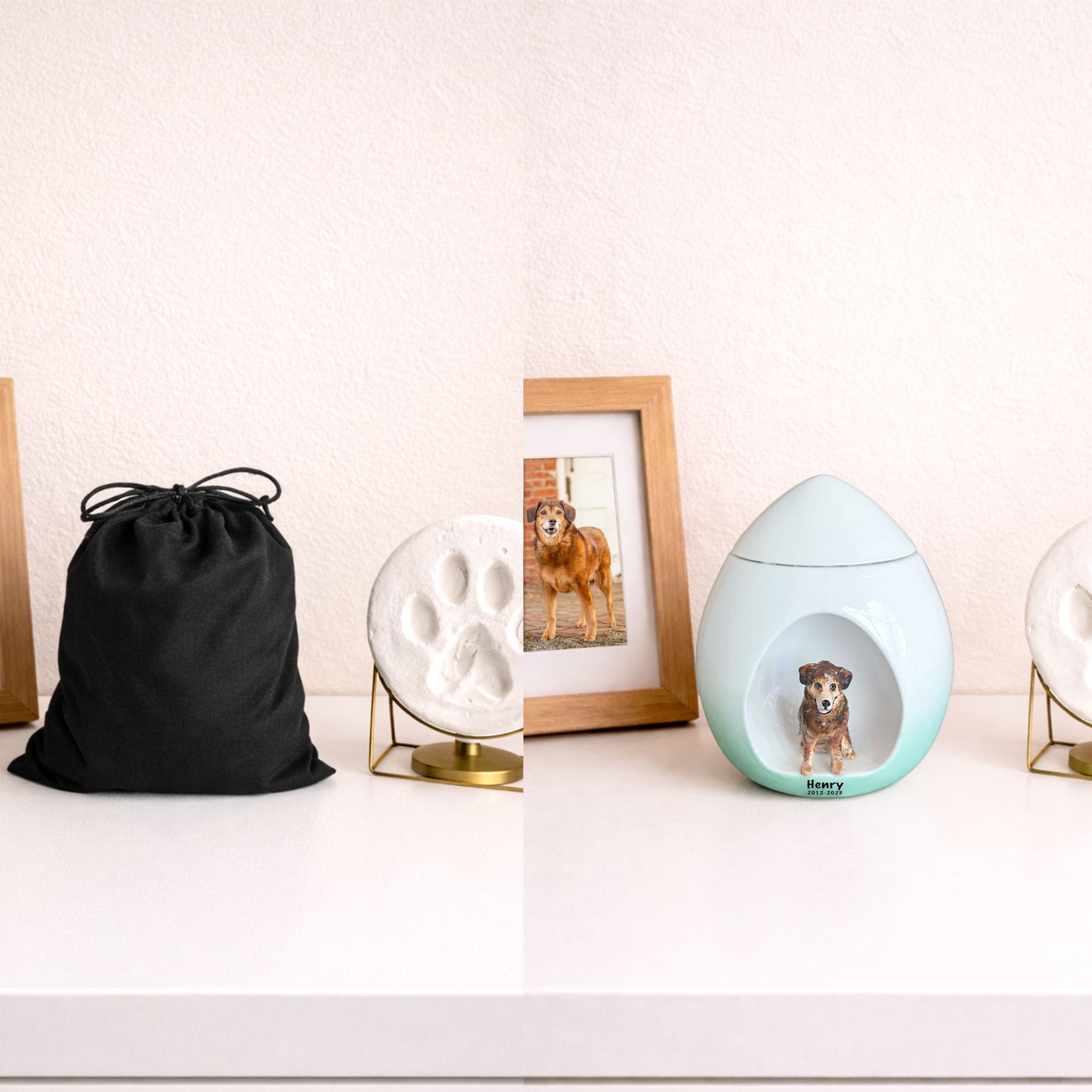 Mint-tinted white pet urn with teardrop shape and a dog figurine inset