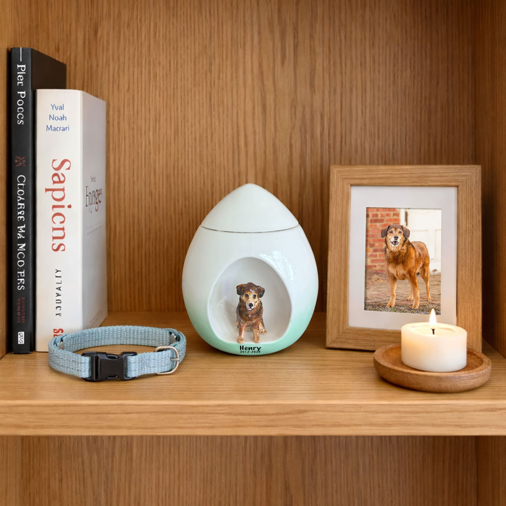 White pet urn with mint-green base and a dog figurine inset with engraved name