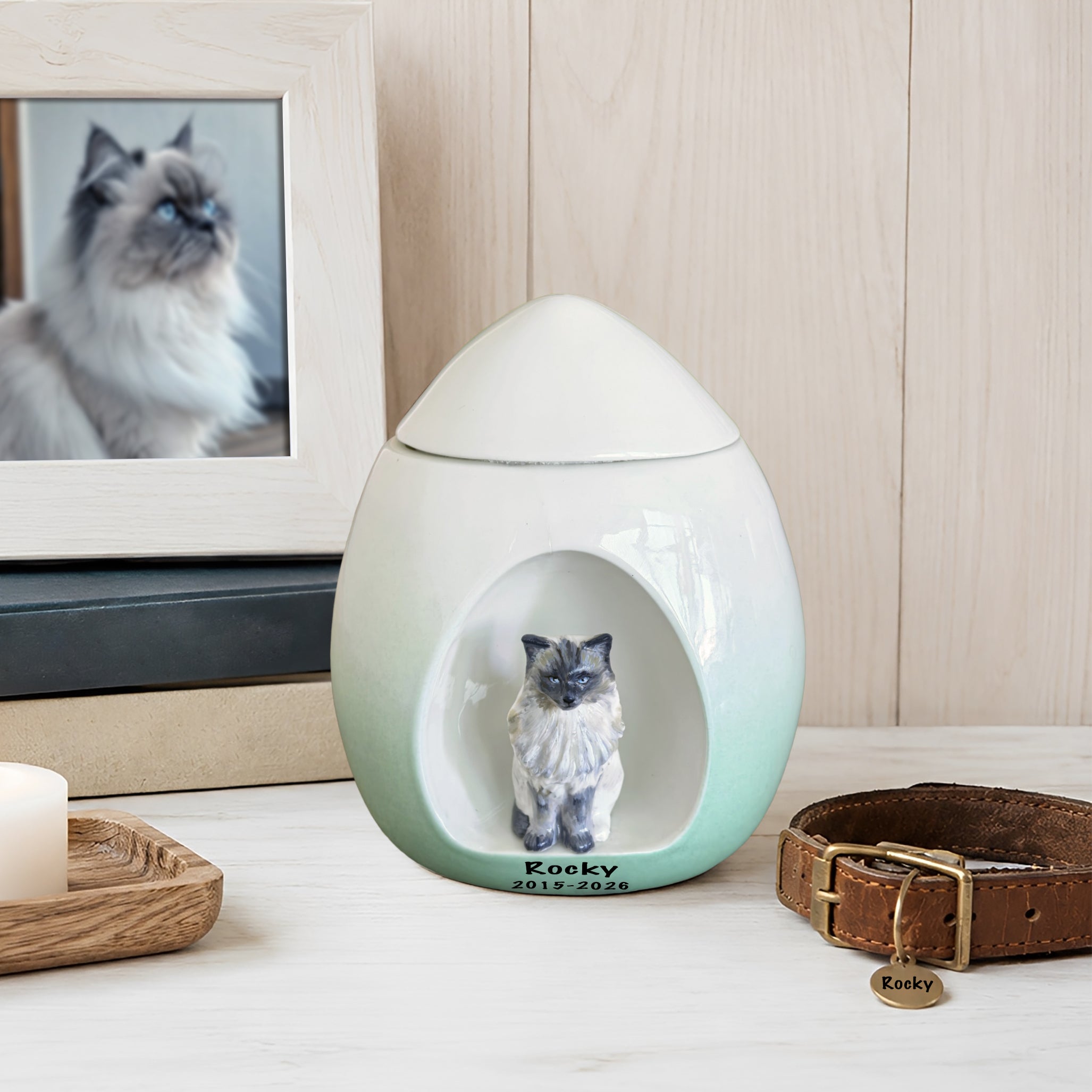 Custom cat urn for ashes with sculpted cat figurine, personalized name and dates, photo frame, candle, and collar