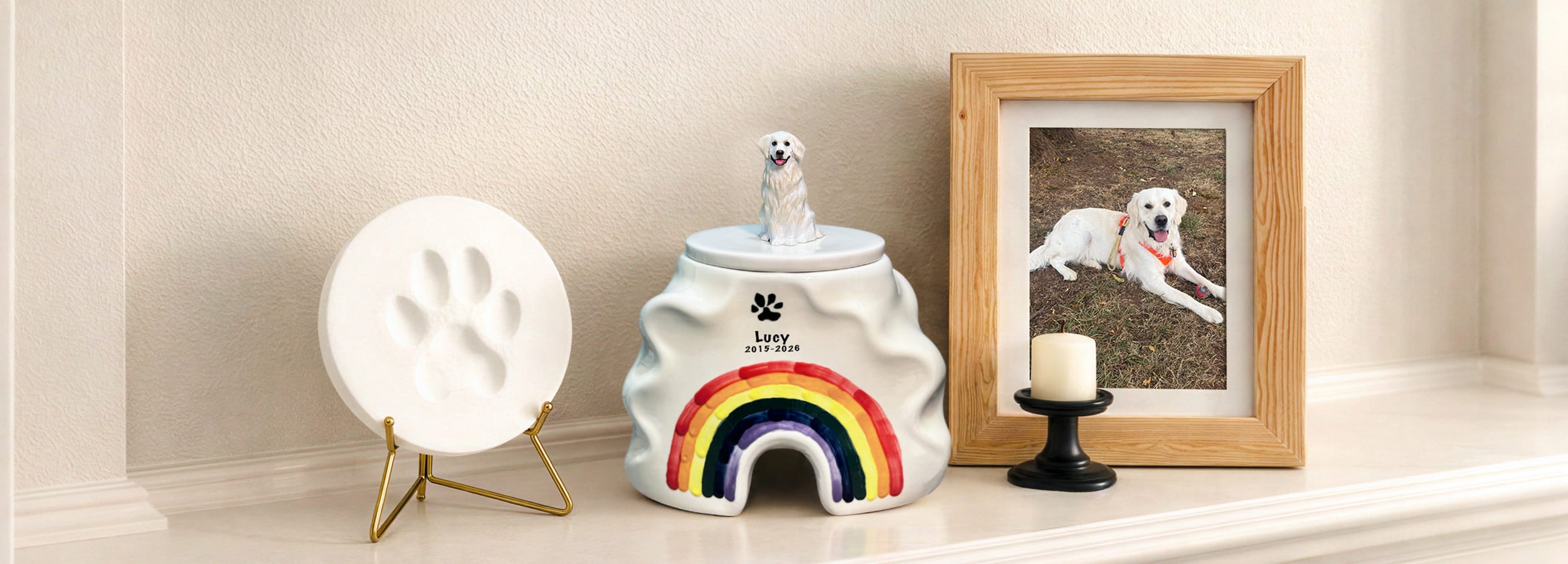 Pet memorial ideas and placement banner showing a ceramic dog urn, paw print keepsake, candle, and framed photo displayed in a home setting.