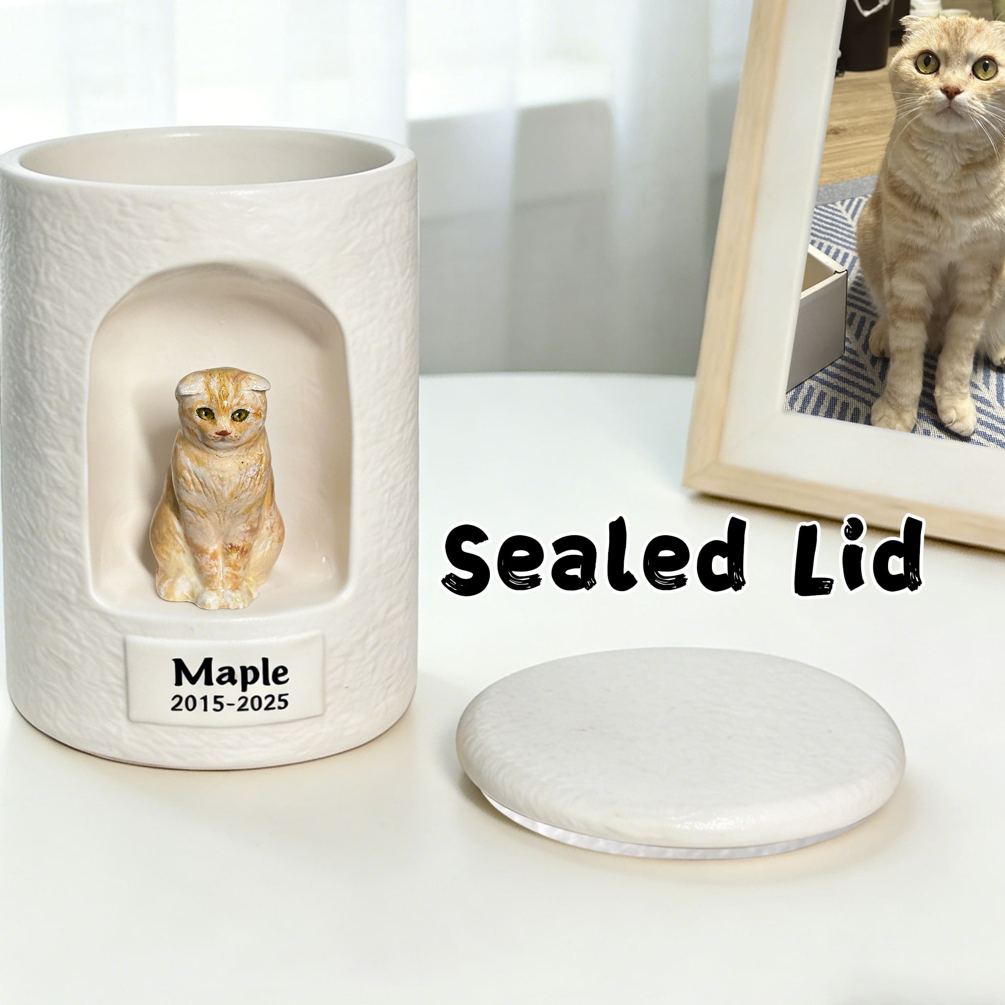 White ceramic cat urn with sculpted seated cat figurine and matching sealed lid