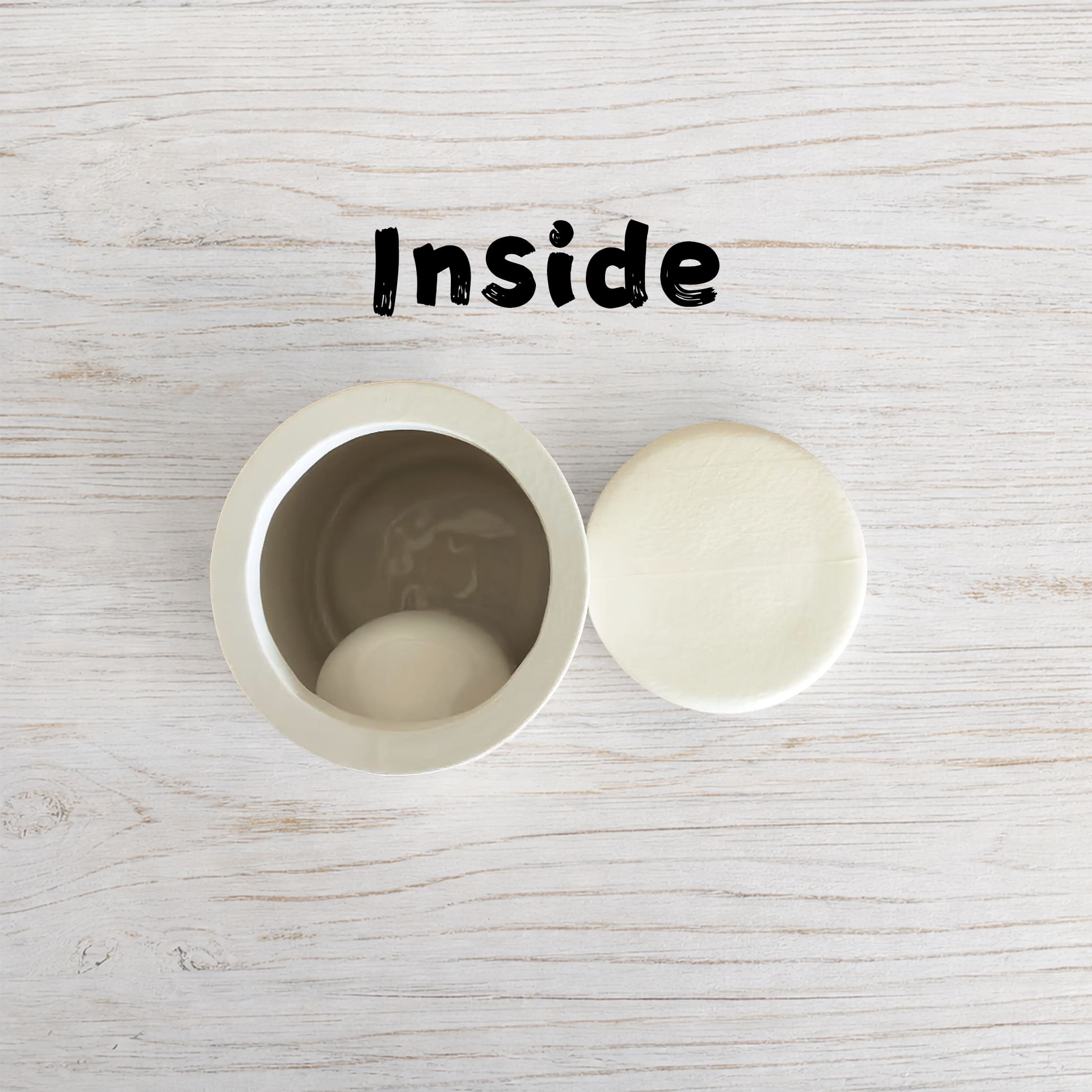 White ceramic dog urn interior with open cavity and matching lid