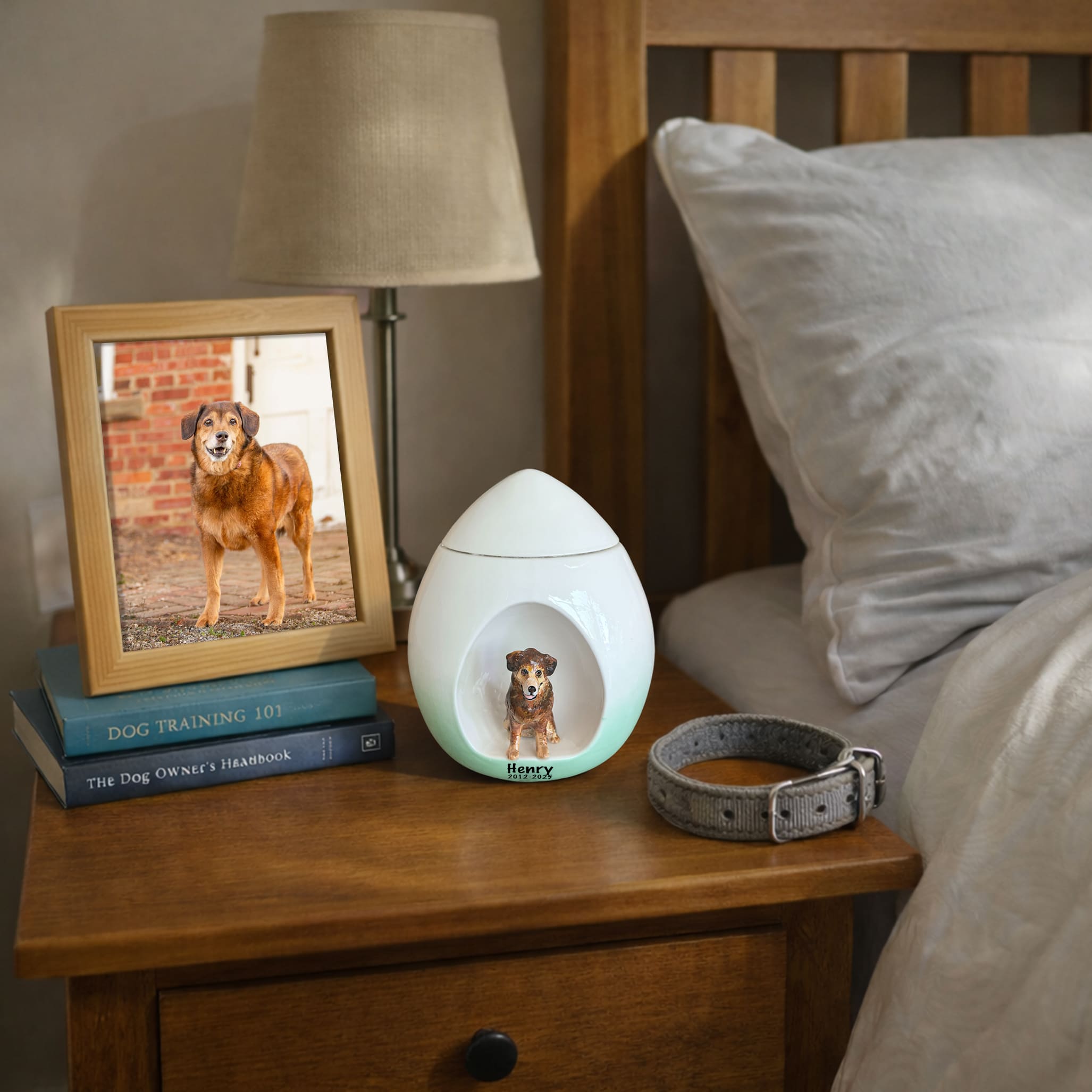 White dog memorial urn with oval opening and dog figurine, name panel