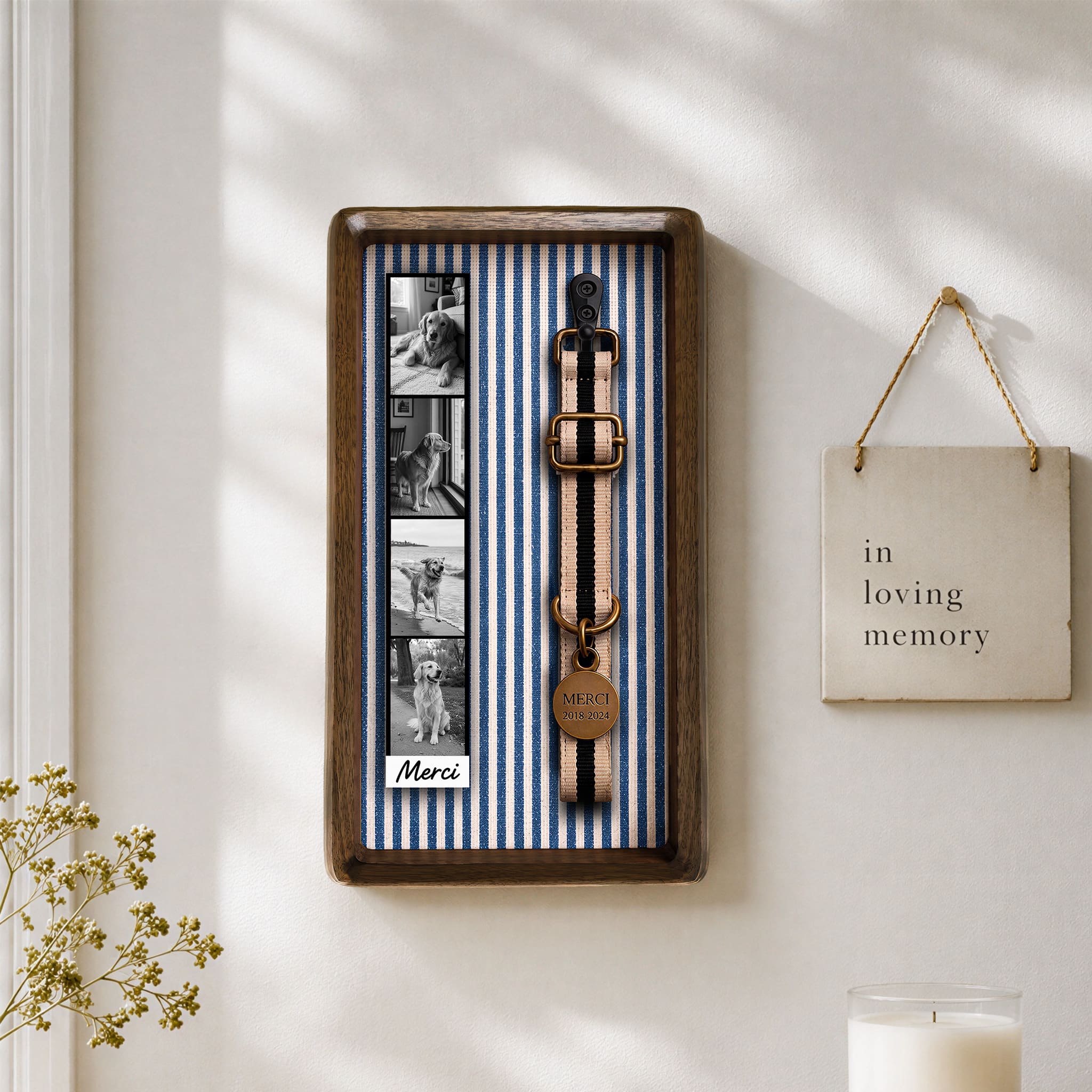 Pet collar memorial frame displayed on a warm home wall, designed to hold a pet photo strip and the customer’s own collar