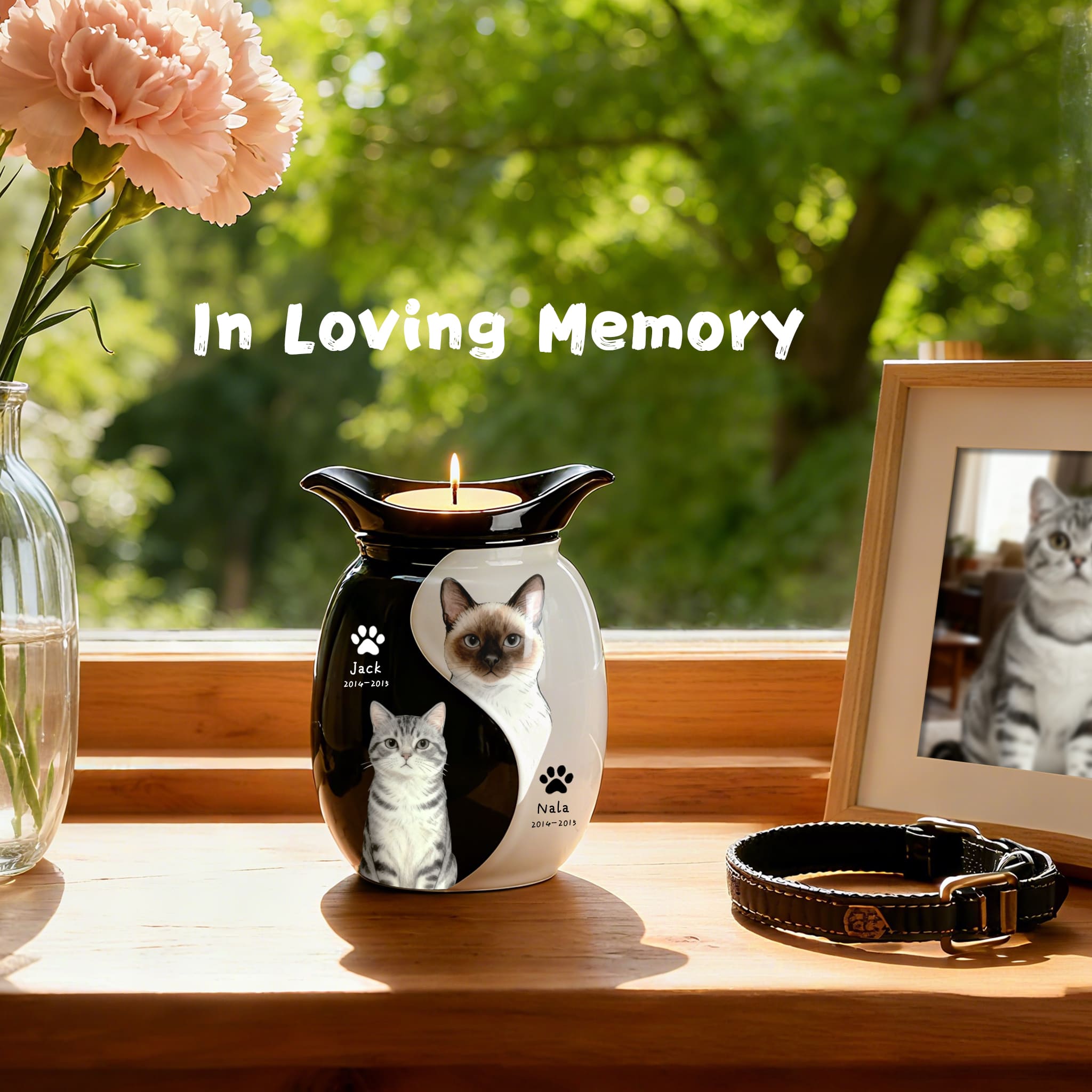 Double pet urn with cat and dog portrait figurines and burning candle in center