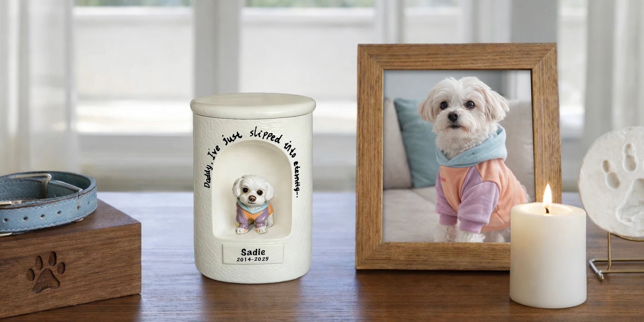 Personalized ceramic dog urn with custom dog figurine beside framed pet photo in a peaceful home memorial setting